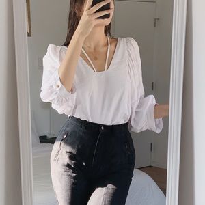 Anthropologie white puff-sleeve blouse